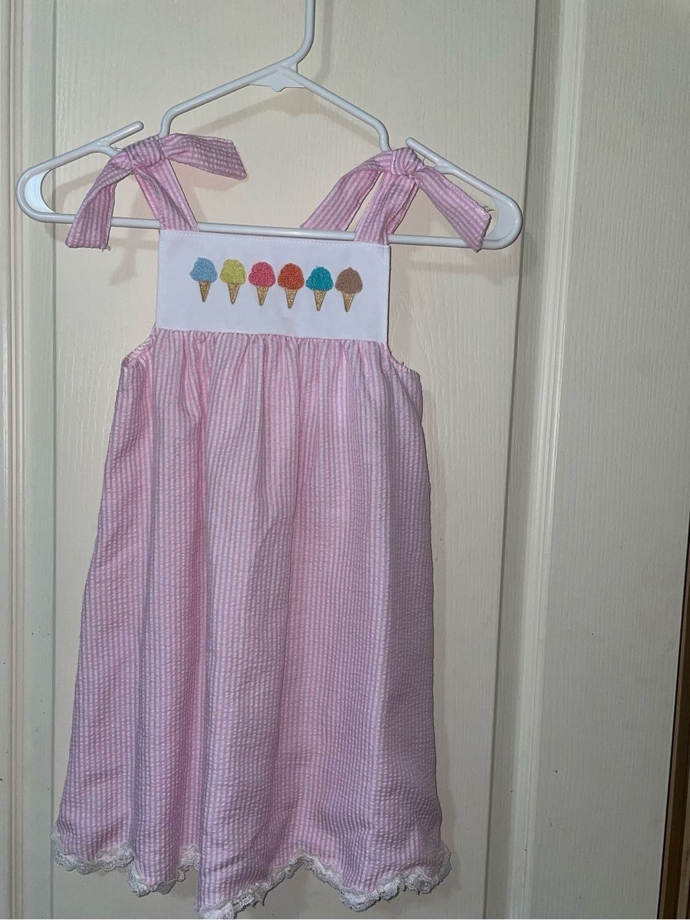 Abby and Evie seersucker dress with ice cream cones embroidered on the front